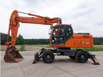 حفارة على عجلات Doosan DX190W (INCL. BLADE + OUTRIGGERS)