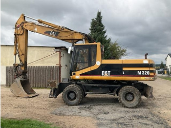 حفارة على عجلات CATERPILLAR M320
