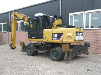 حفارة على عجلات Caterpillar M318D: صور 2