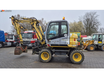 حفارة على عجلات NEW HOLLAND