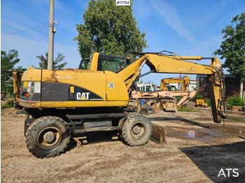 حفارة على عجلات 2004 CAT M316C: صور 4