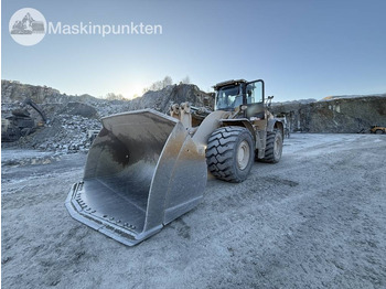 اللودر بعجل CATERPILLAR