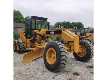 آلة تسوية الأرض CATERPILLAR 140H