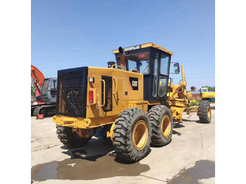 آلة تسوية الأرض CATERPILLAR 140K