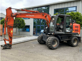 حفارة على عجلات HITACHI ZX140W-3