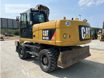 حفارة على عجلات Cat M318D: صور 4