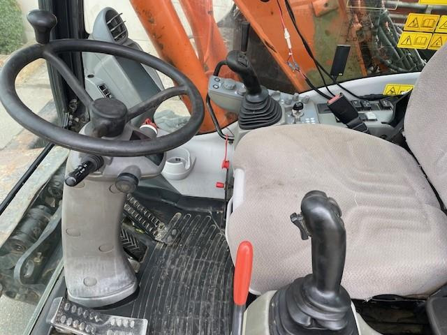 حفارة على عجلات Hitachi ZX140W-5B: صور 8