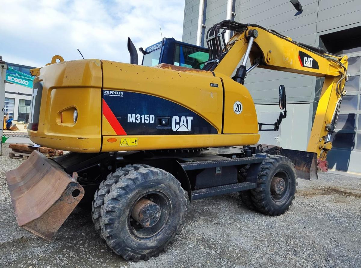 Caterpillar M315D - حفارة على عجلات: صور 4 Caterpillar M315D - حفارة على عجلات: صور 4