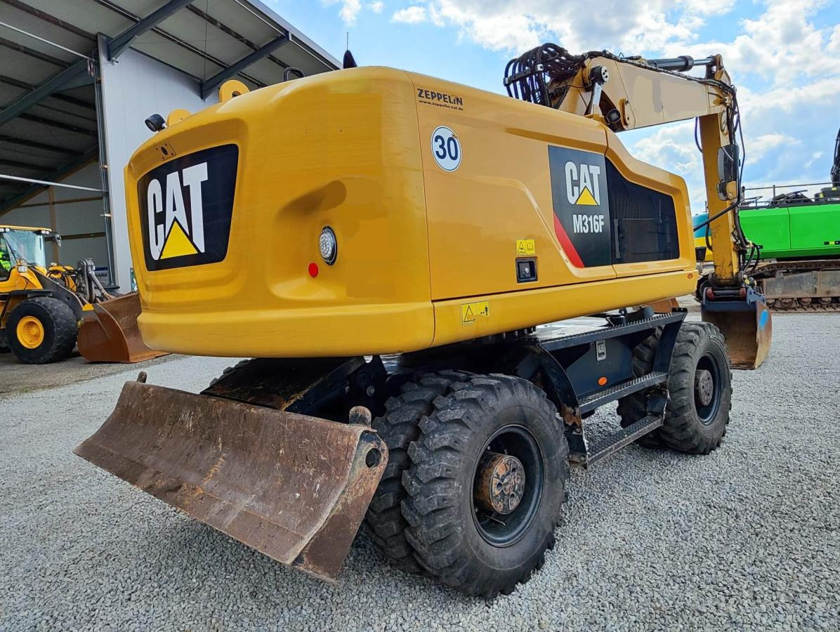 Caterpillar M316F - حفارة على عجلات: صور 4 Caterpillar M316F - حفارة على عجلات: صور 4