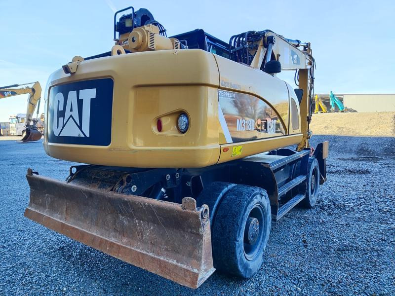 Caterpillar M318D MH - حفارة على عجلات: صور 1 Caterpillar M318D MH - حفارة على عجلات: صور 1