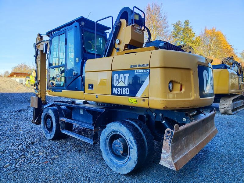 Caterpillar M318D MH - حفارة على عجلات: صور 4 Caterpillar M318D MH - حفارة على عجلات: صور 4