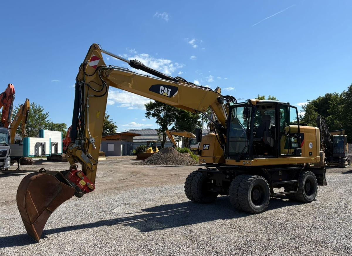Caterpillar M318F - حفارة على عجلات: صور 2 Caterpillar M318F - حفارة على عجلات: صور 2