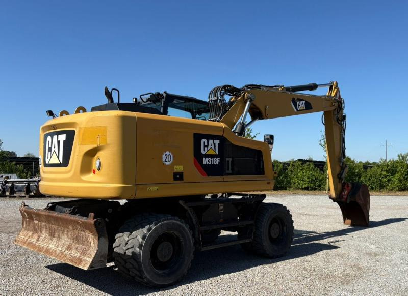 Caterpillar M318F - حفارة على عجلات: صور 4 Caterpillar M318F - حفارة على عجلات: صور 4