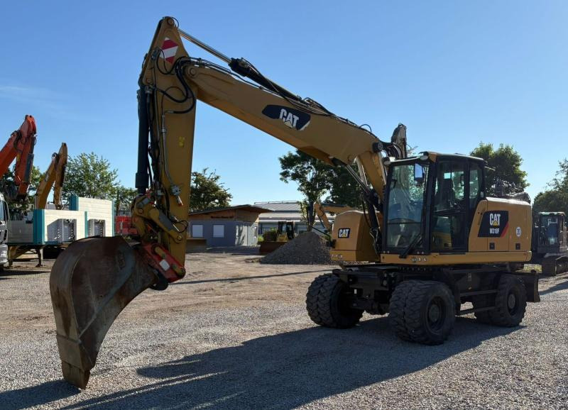Caterpillar M318F - حفارة على عجلات: صور 2 Caterpillar M318F - حفارة على عجلات: صور 2