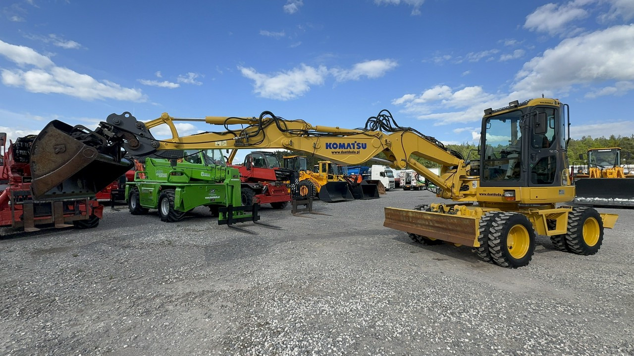 Komatsu PW 98 MR 8 Pług + Podpory 10ton Szybkozłącze - حفارة على عجلات: صور 3 Komatsu PW 98 MR 8 Pług + Podpory 10ton Szybkozłącze - حفارة على عجلات: صور 3