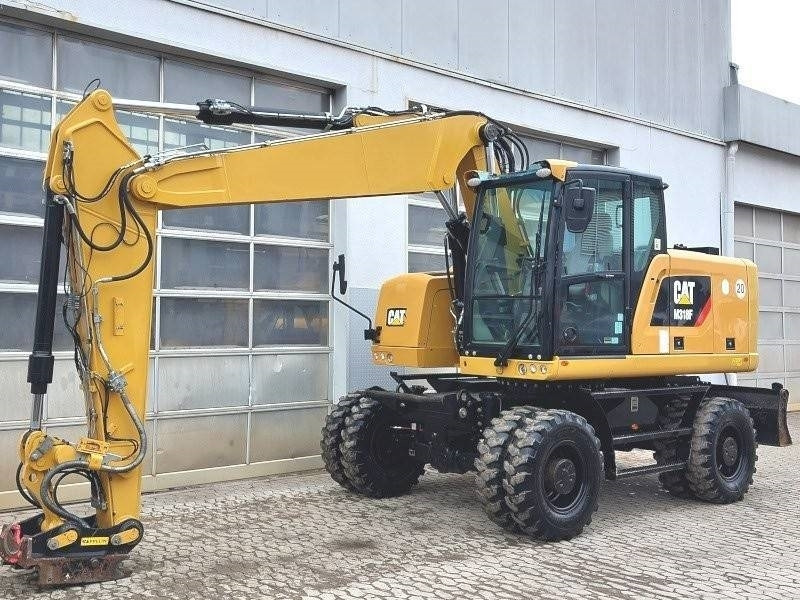 Caterpillar M 318 F - حفارة على عجلات: صور 2 Caterpillar M 318 F - حفارة على عجلات: صور 2