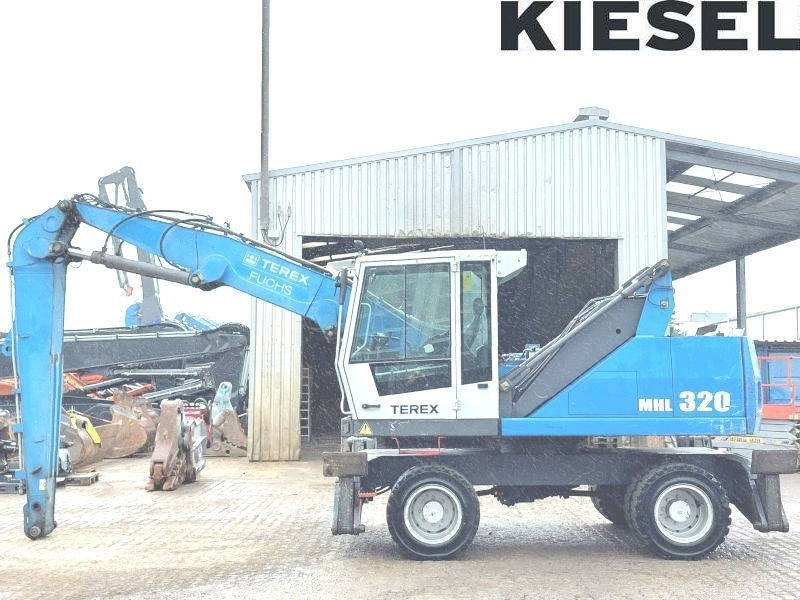 Fuchs MHL 320 D - حفارة النقل والشحن: صور 1 Fuchs MHL 320 D - حفارة النقل والشحن: صور 1