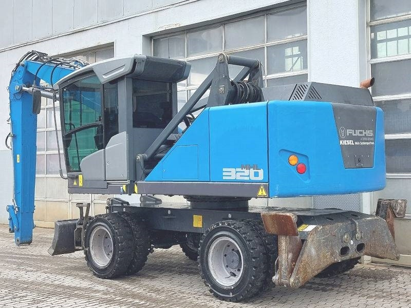 Fuchs MHL 320 F - حفارة النقل والشحن: صور 3 Fuchs MHL 320 F - حفارة النقل والشحن: صور 3