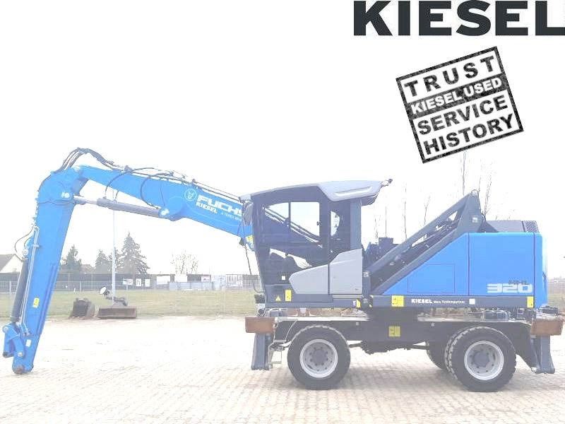 Fuchs MHL 320 F - حفارة النقل والشحن: صور 1 Fuchs MHL 320 F - حفارة النقل والشحن: صور 1