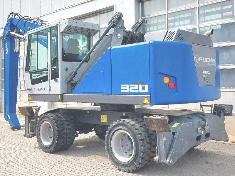 Fuchs MHL 320 F - حفارة النقل والشحن: صور 3 Fuchs MHL 320 F - حفارة النقل والشحن: صور 3