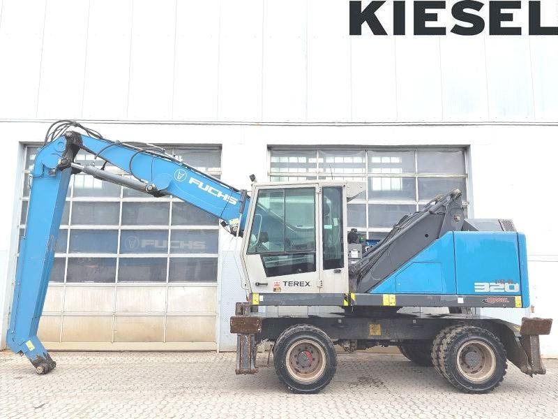 Fuchs MHL 320 F - حفارة النقل والشحن: صور 1 Fuchs MHL 320 F - حفارة النقل والشحن: صور 1