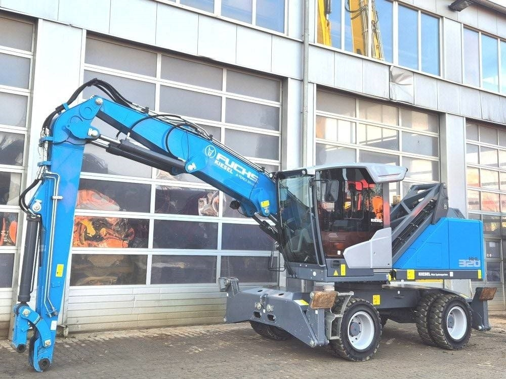 Fuchs MHL 320 F - حفارة النقل والشحن: صور 2 Fuchs MHL 320 F - حفارة النقل والشحن: صور 2