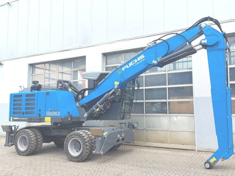 Fuchs MHL 320 F - حفارة النقل والشحن: صور 4 Fuchs MHL 320 F - حفارة النقل والشحن: صور 4
