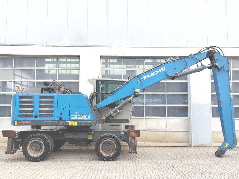 Fuchs MHL 320 F - حفارة النقل والشحن: صور 5 Fuchs MHL 320 F - حفارة النقل والشحن: صور 5