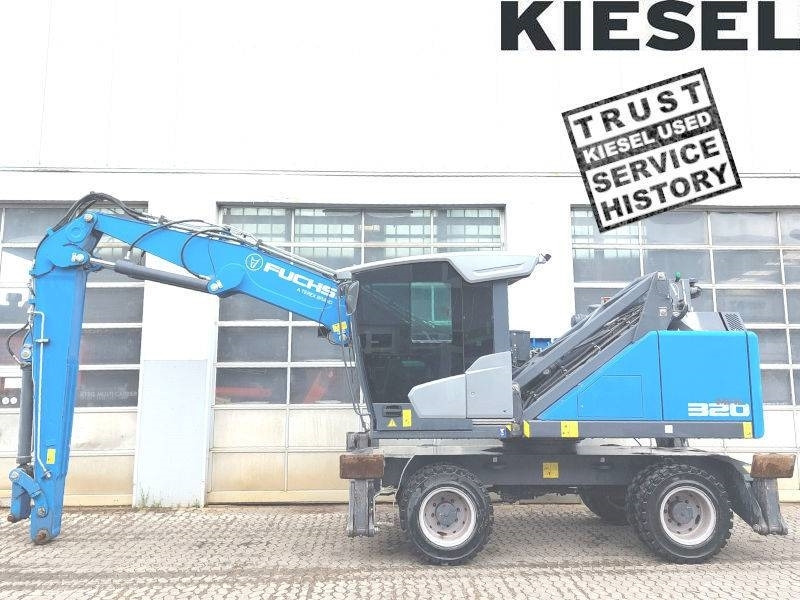 Fuchs MHL 320 F - حفارة النقل والشحن: صور 1 Fuchs MHL 320 F - حفارة النقل والشحن: صور 1