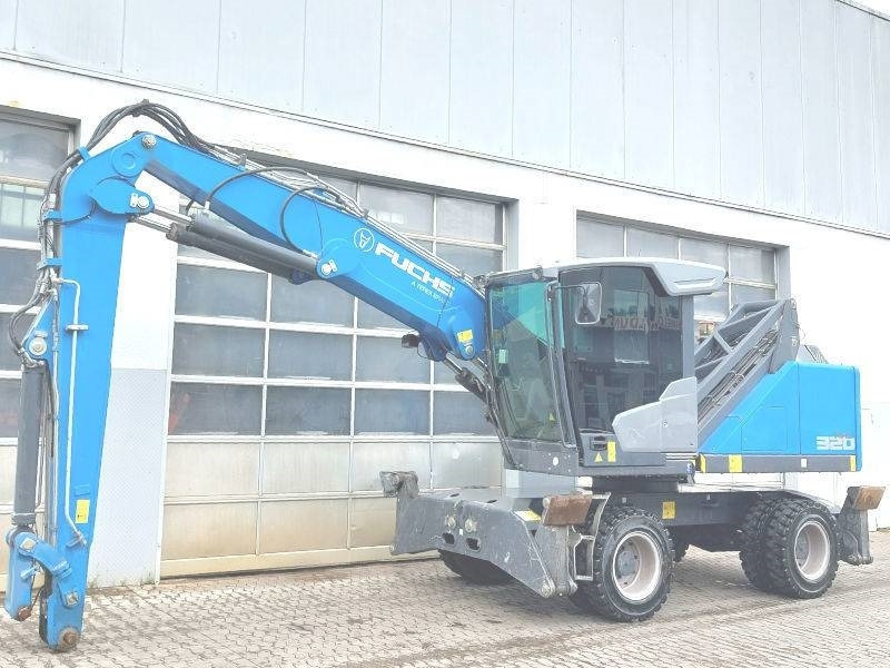Fuchs MHL 320 F - حفارة النقل والشحن: صور 2 Fuchs MHL 320 F - حفارة النقل والشحن: صور 2