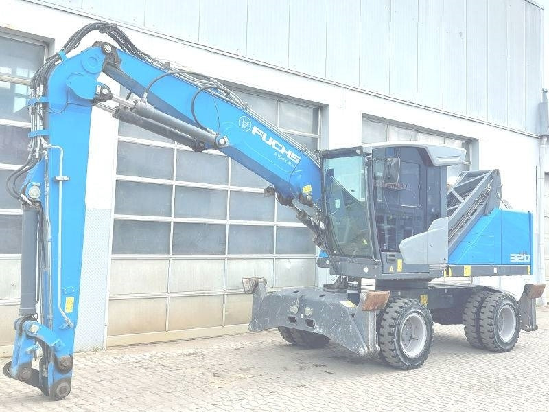 Fuchs MHL 320 F - حفارة النقل والشحن: صور 2 Fuchs MHL 320 F - حفارة النقل والشحن: صور 2