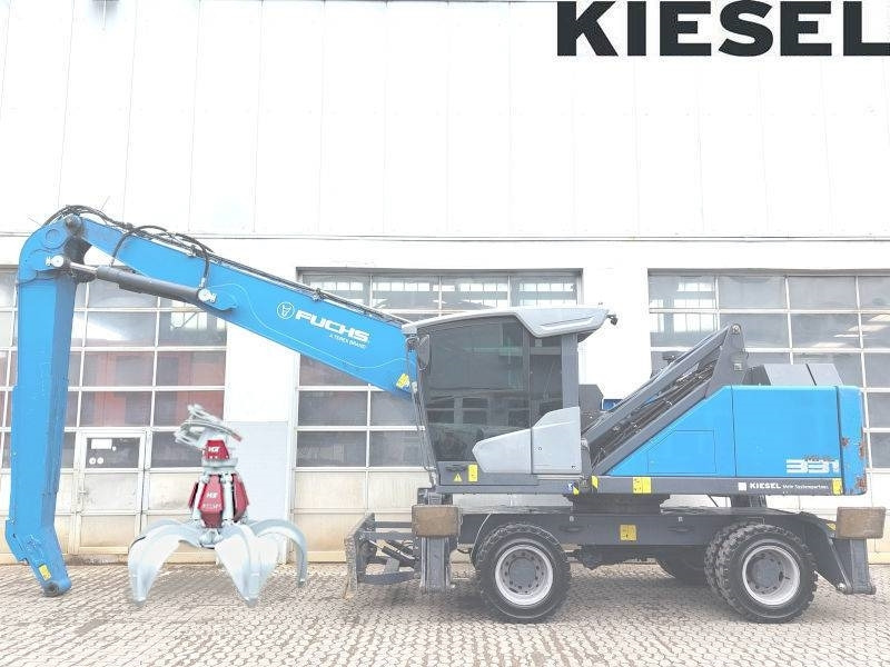 Fuchs MHL 331 F - حفارة النقل والشحن: صور 1 Fuchs MHL 331 F - حفارة النقل والشحن: صور 1