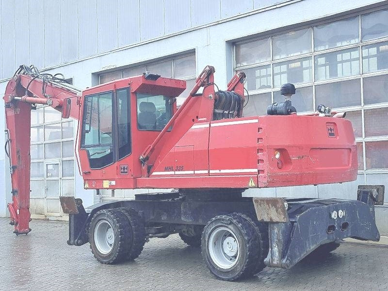 Fuchs MHL 335 D  - حفارة النقل والشحن: صور 3 Fuchs MHL 335 D  - حفارة النقل والشحن: صور 3