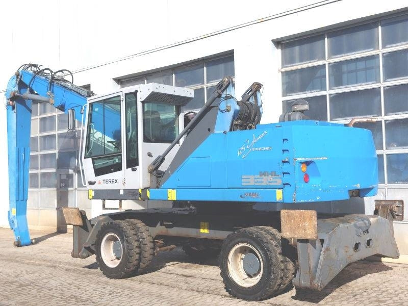 Fuchs MHL 335 E - حفارة النقل والشحن: صور 3 Fuchs MHL 335 E - حفارة النقل والشحن: صور 3