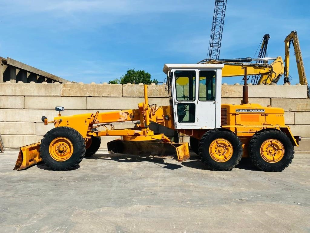 John Deere 570 A - آلة تسوية الأرض: صور 1 John Deere 570 A - آلة تسوية الأرض: صور 1