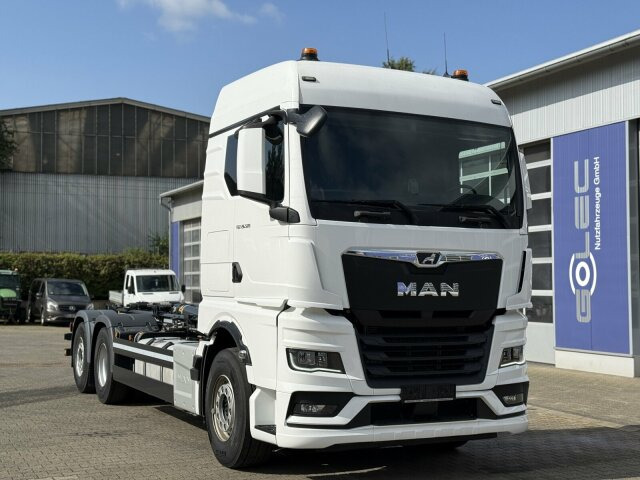 MAN TGX 26.520 6x2 Abrollkipper MEILLER RS 21.70 - شاحنة ذات الخطاف: صور 1 MAN TGX 26.520 6x2 Abrollkipper MEILLER RS 21.70 - شاحنة ذات الخطاف: صور 1