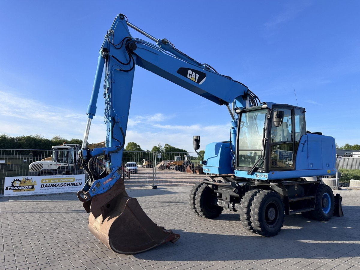 CATERPILLAR M 318 F Oil Quick OQ 65 Deutsche Maschine Top ! - حفارة على عجلات: صور 3 CATERPILLAR M 318 F Oil Quick OQ 65 Deutsche Maschine Top ! - حفارة على عجلات: صور 3