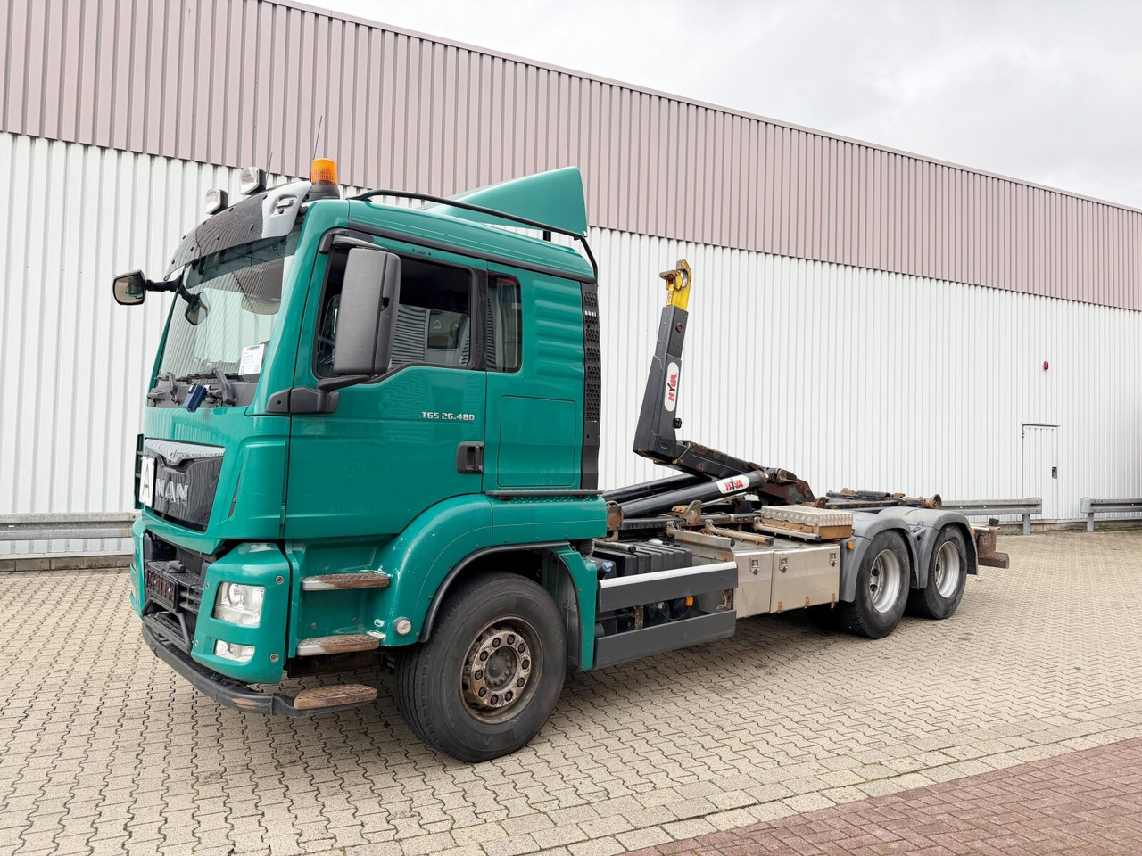 MAN TGS 26.480 6x4 BL TGS 26.480 6x4 BL, Motorabtrieb, Navi, Intarder, Hyva 20.60 S - شاحنة ذات الخطاف: صور 1 MAN TGS 26.480 6x4 BL TGS 26.480 6x4 BL, Motorabtrieb, Navi, Intarder, Hyva 20.60 S - شاحنة ذات الخطاف: صور 1