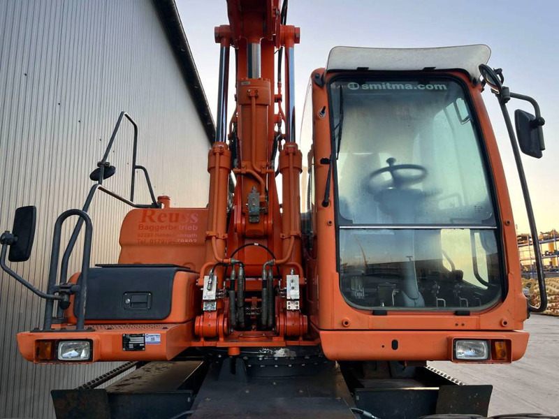 حفارة على عجلات Doosan DX170W: صور 14