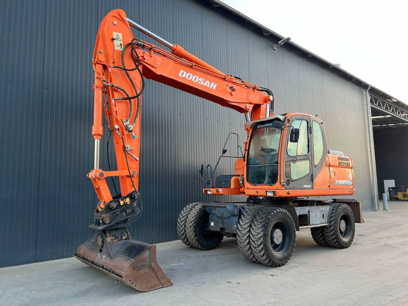 Doosan DX170W - حفارة على عجلات: صور 1 Doosan DX170W - حفارة على عجلات: صور 1