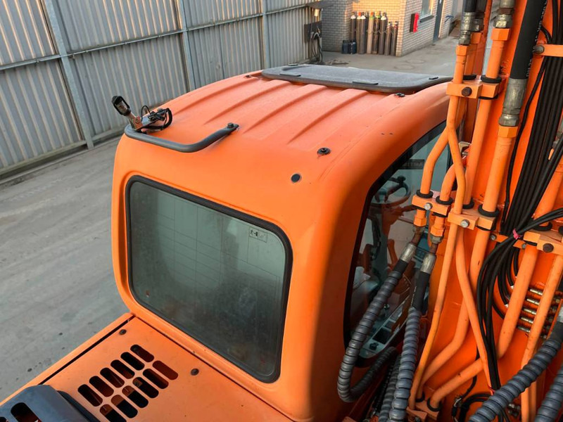 حفارة على عجلات Doosan DX170W: صور 20