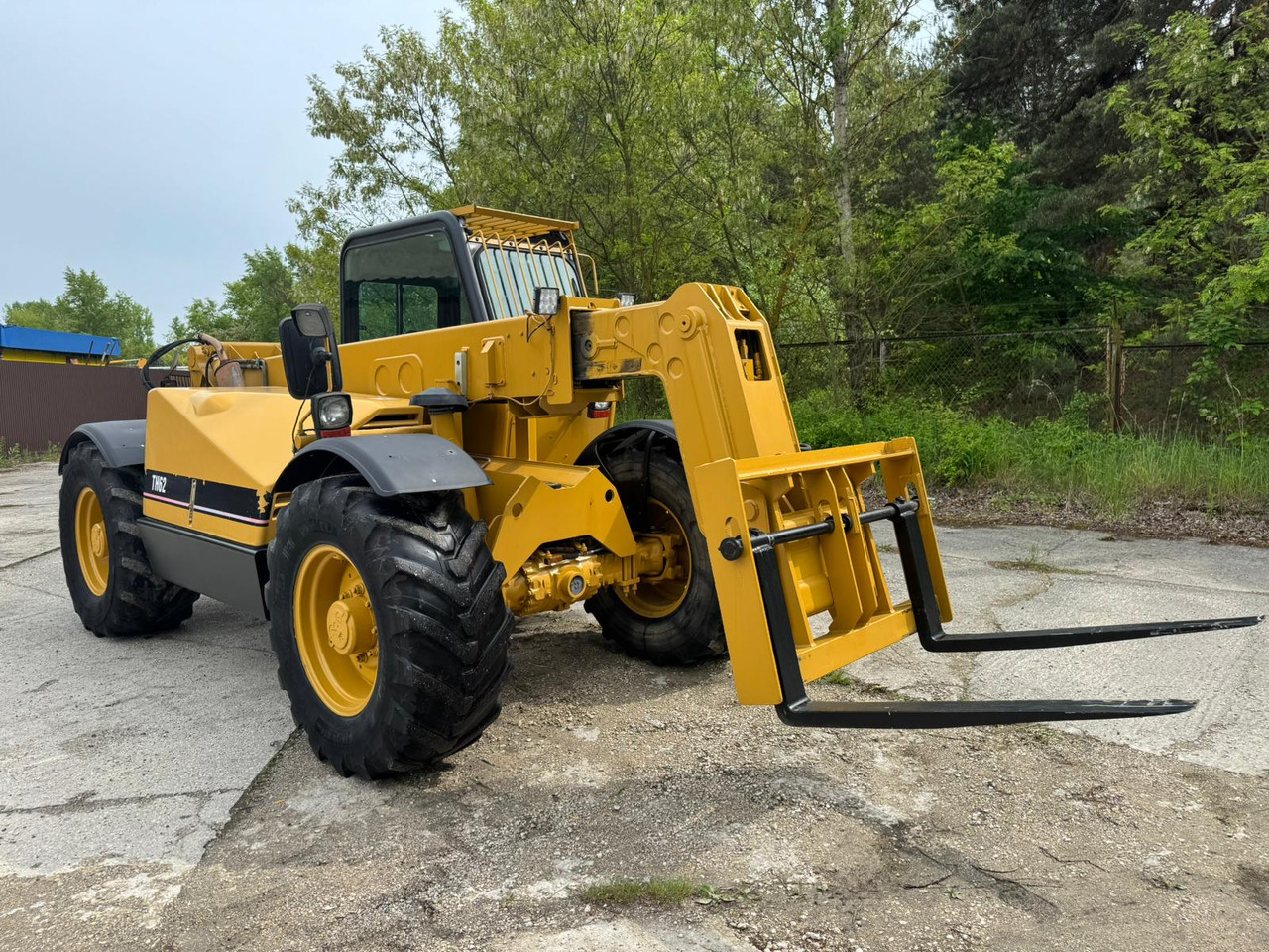 CATERPILLAR CAT TH 62 - اللودر بعجل: صور 1 CATERPILLAR CAT TH 62 - اللودر بعجل: صور 1