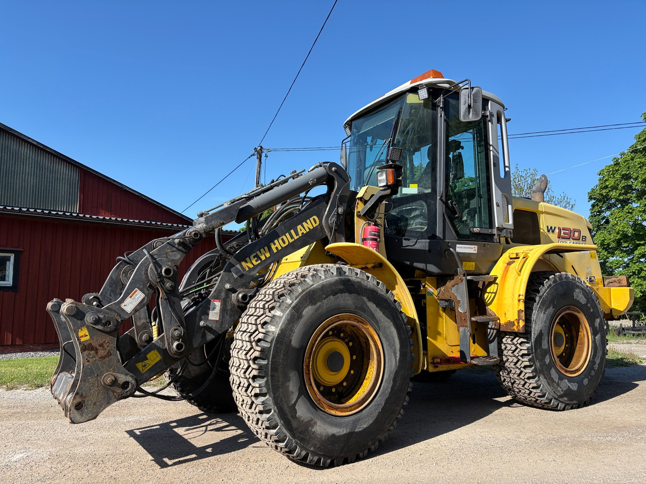 New Holland W130B - اللودر بعجل: صور 1 New Holland W130B - اللودر بعجل: صور 1
