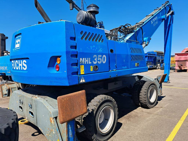 Fuchs MHL 350 D - حفارة النقل والشحن: صور 2 Fuchs MHL 350 D - حفارة النقل والشحن: صور 2