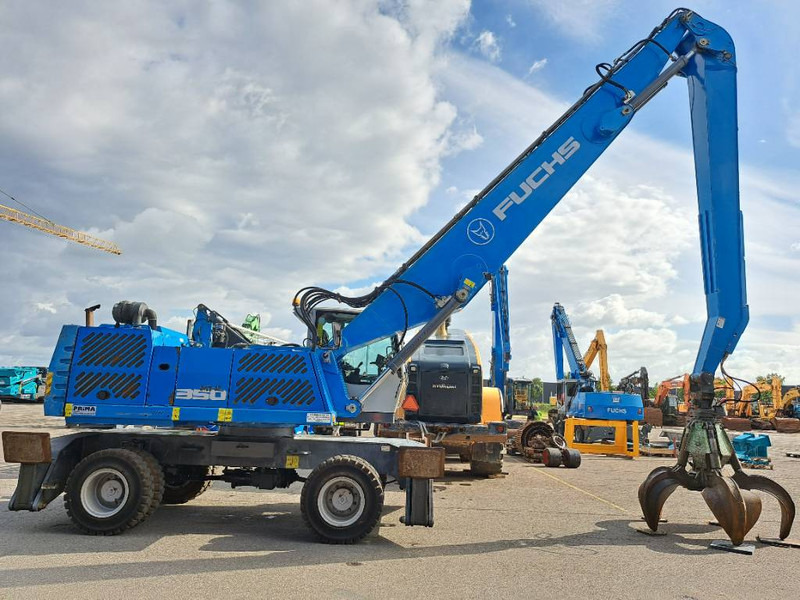 Fuchs MHL 350 E - حفارة النقل والشحن: صور 5 Fuchs MHL 350 E - حفارة النقل والشحن: صور 5