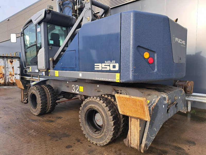 Fuchs MHL 350 F - حفارة النقل والشحن: صور 4 Fuchs MHL 350 F - حفارة النقل والشحن: صور 4