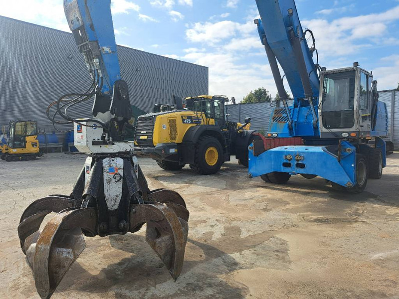 Fuchs MHL 360 D - حفارة النقل والشحن: صور 1 Fuchs MHL 360 D - حفارة النقل والشحن: صور 1