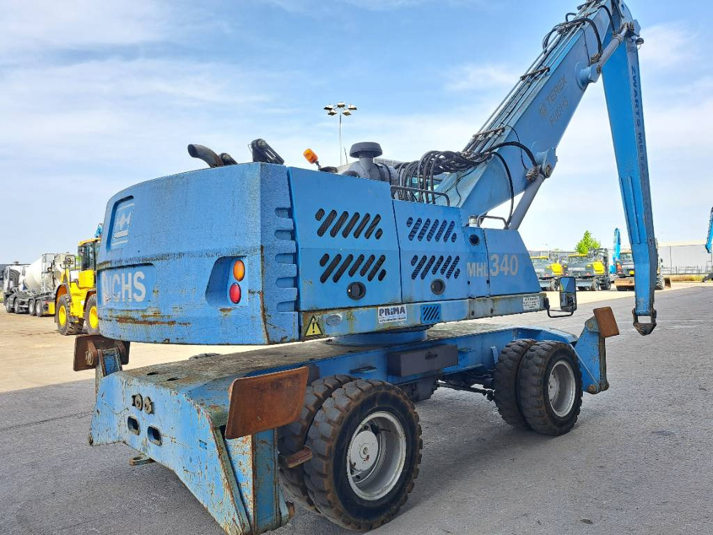 Fuchs MHL340D - حفارة النقل والشحن: صور 3 Fuchs MHL340D - حفارة النقل والشحن: صور 3