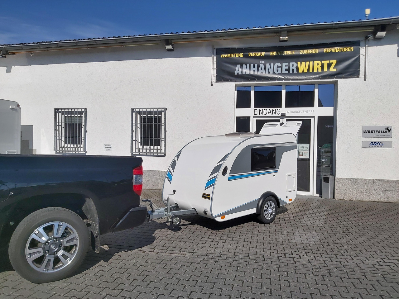 كرفان سحب Mini Camper Mini Tommy TMC25 252x140x121cm aero V1 Küche 12V/230V 100km/H 750kg gebremst Modell 24: صور 7