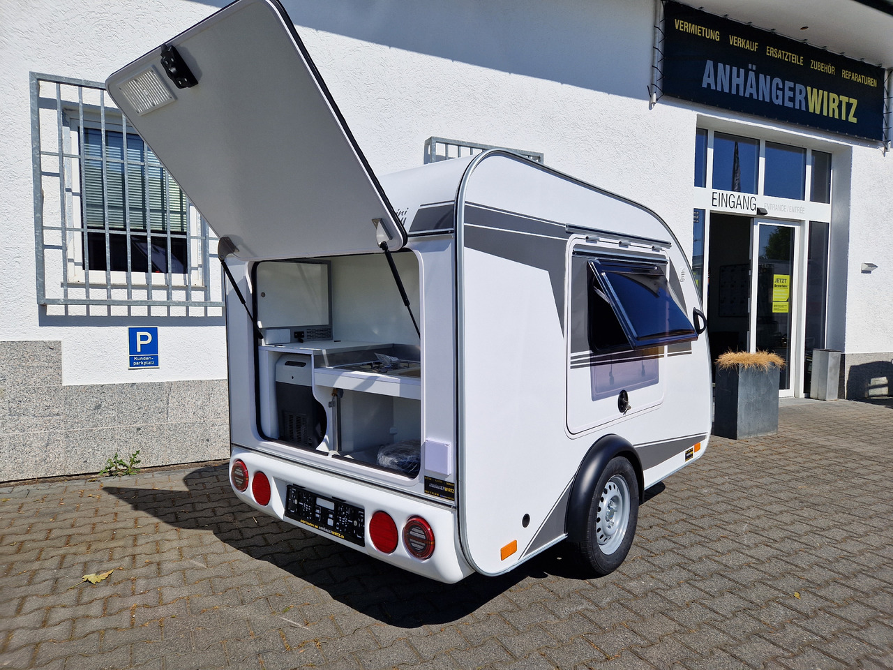كرفان سحب Mini Camper Mini Tommy TMC25 252x140x121cm aero V1 Küche 12V/230V 100km/H 750kg gebremst Modell 24: صور 16
